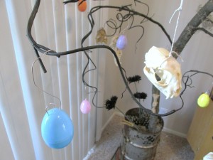 Holiday tree with skulls and Easter eggs